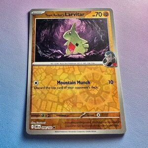 team rocket’s larvitar [reverse] - 094/182 (common) — pokemon: destined rivals